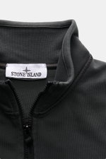Stone Island Sweatshirt Jacket Dark Grey shown in close-up from front perspective, featuring high stand-up collar and zipper.

<p>Relaxed basic by STONE ISLAND: With sporty casualness, the garment-dyed sweatshirt jacket made of soft cotton accompanies us 