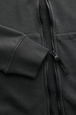 Close-up front view of Stone Island Sweatshirt Jacket Dark Grey showing zipper, ribbed cuff, and fabric texture.

<p>Relaxed basic by STONE ISLAND: With sporty casualness, the garment-dyed sweatshirt jacket made of soft cotton accompanies us in sports and