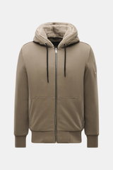 Front view of the Moose Knuckles Sweat jacket 'Classic Bunny' taupe with a zip, drawstring hood, and soft faux fur lining.

<p>Perfect for cold days: With lightweight padding and a hood with detachable faux fur lining, you will be well-equipped when it’s 