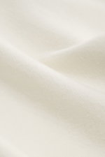 04651/ A trip in a bag Kapuzenpullover 'CW Hoodie' creme, seitliche Frontperspektive, Mix aus Wolle und Baumwolle, weicher Griff, Regular Fit, Kapuze, Weblabel, Rippbündchen