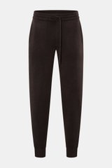Front view of von Braun Cashmere jogger pants dark brown, showing tapered fit, high waist, elasticated waistband with drawstring, angled hip pockets, and hip pockets on the seat. 

<p>VON BRAUN focuses on sporty comfort with these soft, warm cashmere jogg