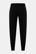 Rear view of von Braun Cashmere jogger pants black in tapered fit with elasticated waistband, angled hip pockets, and high waist in soft cashmere knit.

<p>VON BRAUN focuses on sporty comfort with these soft, warm cashmere jogger pants made from high-qual