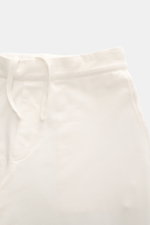 04651/ A trip in a bag Jogpants 'If' offwhite, Detailaufnahme von oben, Baumwoll-Jersey, Stretch, Tunnelzugbund, französische Taschen, tapered fit.