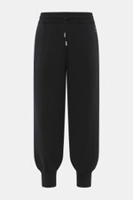 Front view of Ami Paris Merino jogpants black, made of pure merino wool with soft touch, loose fit, high elastic waistband with drawstring, side pockets, leather logo detail, and ribbed cuffs.