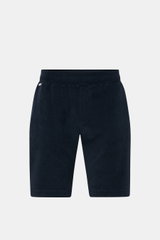 Front view of 04651/ A trip in a bag 'Terry' shorts navy made of soft pure cotton terrycloth with elastic waistband, drawstring, and pockets.

<p>With the model 'Terry' 04651/ A TRIP IN A BAG presents a comfortable pair of shorts in wonderfully soft terry