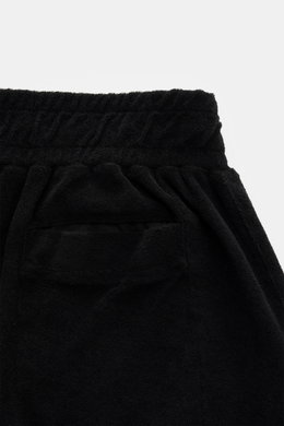 04651/ A trip in a bag Frottee-Shorts 'Terry' schwarz, Detailansicht von hinten oben mit elastischem Bund, Gesäß-Leistentasche, weichem Baumwoll-Frottee.
