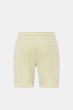 Rückansicht der pastellgrünen 04651/ A trip in a bag Sweat-Shorts 'CL' aus Bio-Baumwolle und Leinen mit elastischem Bund, Tasche, weichem Griff.