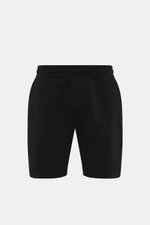 Schwarze 04651/ A trip in a bag Sweatshorts 'Studio' Slim Fit, von hinten fotografiert, Sweat aus reiner Baumwolle, schwere Qualität, weicher Griff, elastischer Bund mit Tunnelzug, angedeuteter Eingriff, französische Taschen, Leistentasche am Gesäß, klein