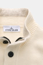 Stone Island Half-zip jumper 'Lambswool' cream shown from a close-up front angle, highlighting the half-zip collar with embossed buttons and knit texture. <p>A stylish essential for the colder months: This timeless half-zip jumper by STONE ISLAND with zip