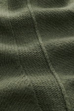 Close-up front view of Stone Island Half-zip jumper 'Lambswool' olive showing medium-fine knit wool blend with soft texture.

Description: <p>A stylish essential for the colder months: This timeless half-zip jumper by STONE ISLAND with zip and embossed bu