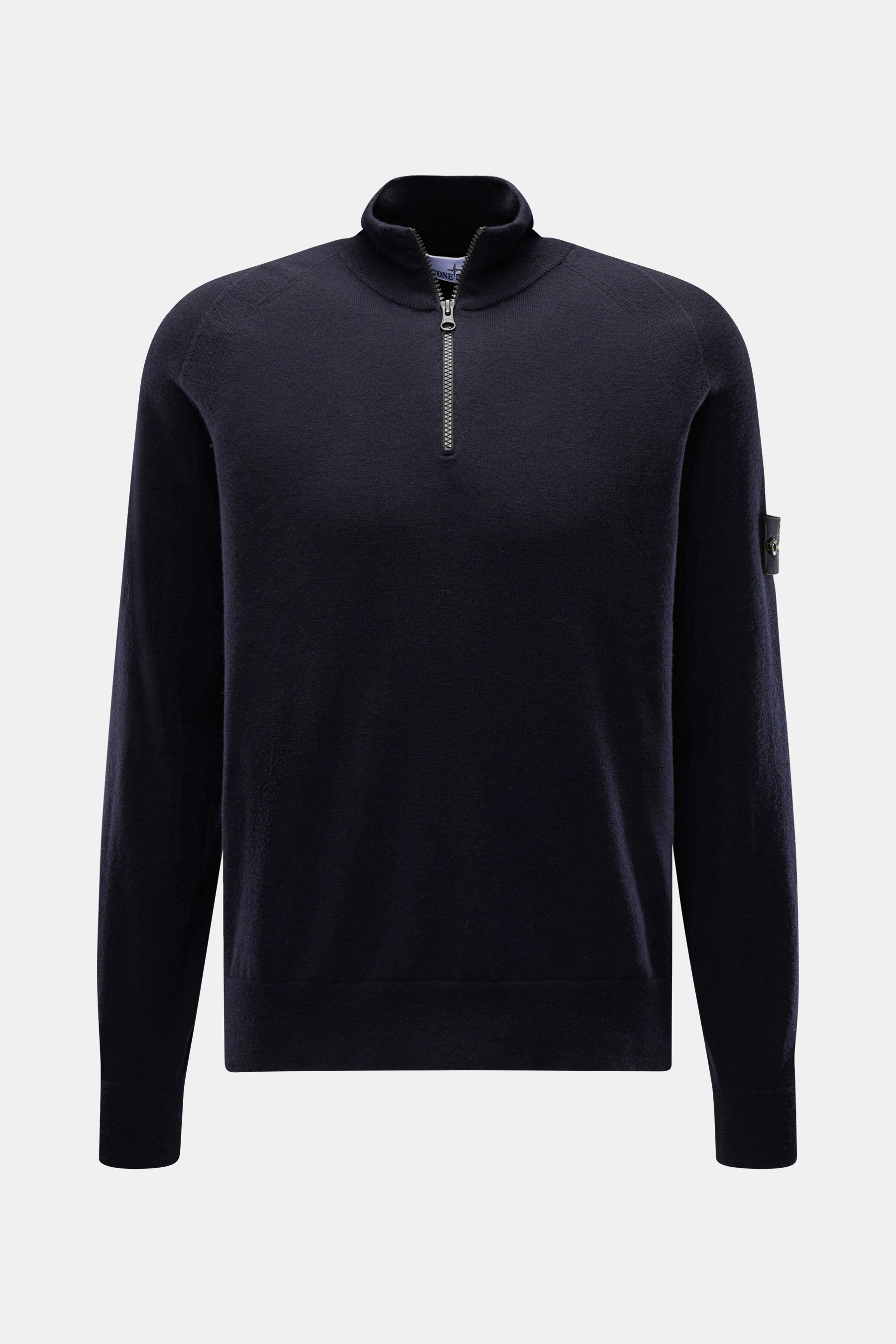 Front view of Stone Island Troyer black quarter-zip jumper in slim fit, made of virgin wool and microfiber with soft touch and fine knit pattern.

Description: <p>Comfort meets style: The STONE ISLAND quarter-zip jumper complements your autumn wardrobe wi