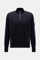 Front view of Stone Island Troyer black quarter-zip jumper in slim fit, made of virgin wool and microfiber with soft touch and fine knit pattern.

Description: <p>Comfort meets style: The STONE ISLAND quarter-zip jumper complements your autumn wardrobe wi