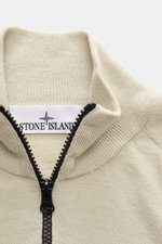 Stone Island Half-Zip Jumper beige shown from top front, featuring ribbed collar with zipper, fine knit pattern, and soft virgin wool blend.