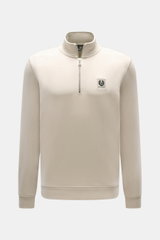 Front view of Belstaff Sweat half-zip jumper 'Quarter Zip' beige, slim fit with soft cotton sweat fabric, half-zip collar, BELSTAFF woven label on chest, and flexible ribbed bands.
