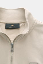 Close-up front view of Belstaff Sweat half-zip jumper 'Quarter Zip' beige, showing half-zip collar, BELSTAFF woven label, sweat fabric made of cotton with soft feel, slim fit, and flexible ribbed bands.