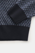 Agnona Cashmere Troyer navy close-up from top side showing ribbed cuff, Zopfstrick pattern, soft pure cashmere knit, regular fit with metal logo.