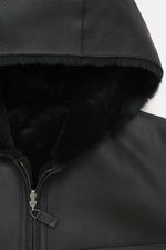 Close-up front view of Emporio Armani Black sheepskin jacket showing supple lamb suede leather, sheepskin lining, regular fit, two-way zipper, practical hood, and side pockets.