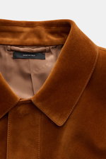 Tom Ford Suede jacket brown shown in close-up from front top perspective, featuring finest calfskin suede, turn-down collar, and soft lining.