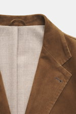 Close-up front view of the Rifugio Brown Suede Blazer showcasing supple suede leather, notched lapel, and soft virgin wool lining.