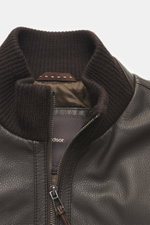 Close-up front view of the Windsor Leather jacket 'Bassano' dark brown showing knitted stand-up collar, two-way zipper, and soft leather texture.