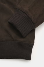 Windsor Velour leather blouson 'Borello' dark brown close-up side view showing soft goat velour leather, knitted elastic cuff, and smooth lining.