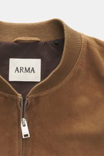 Arma Suede leather blouson 'Didier' brown shown from close-up front top view, highlighting ribbed collar and zipper. Smart and timeless: The blouson 'Didier' by ARMA is made from supple goat suede and impresses with a distinctive blouson collar, elastic r