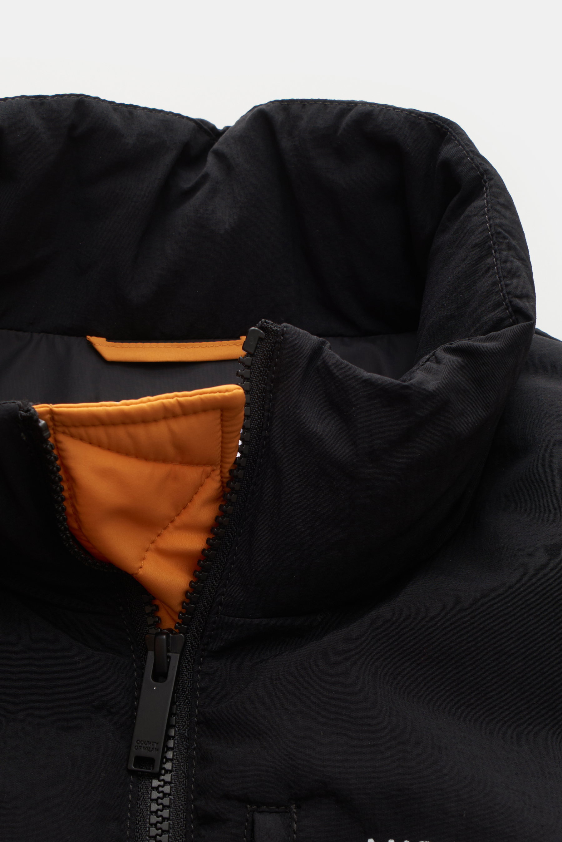 MARCELO BURLON quilted jacket 'Cross Block Puffer' orange/black