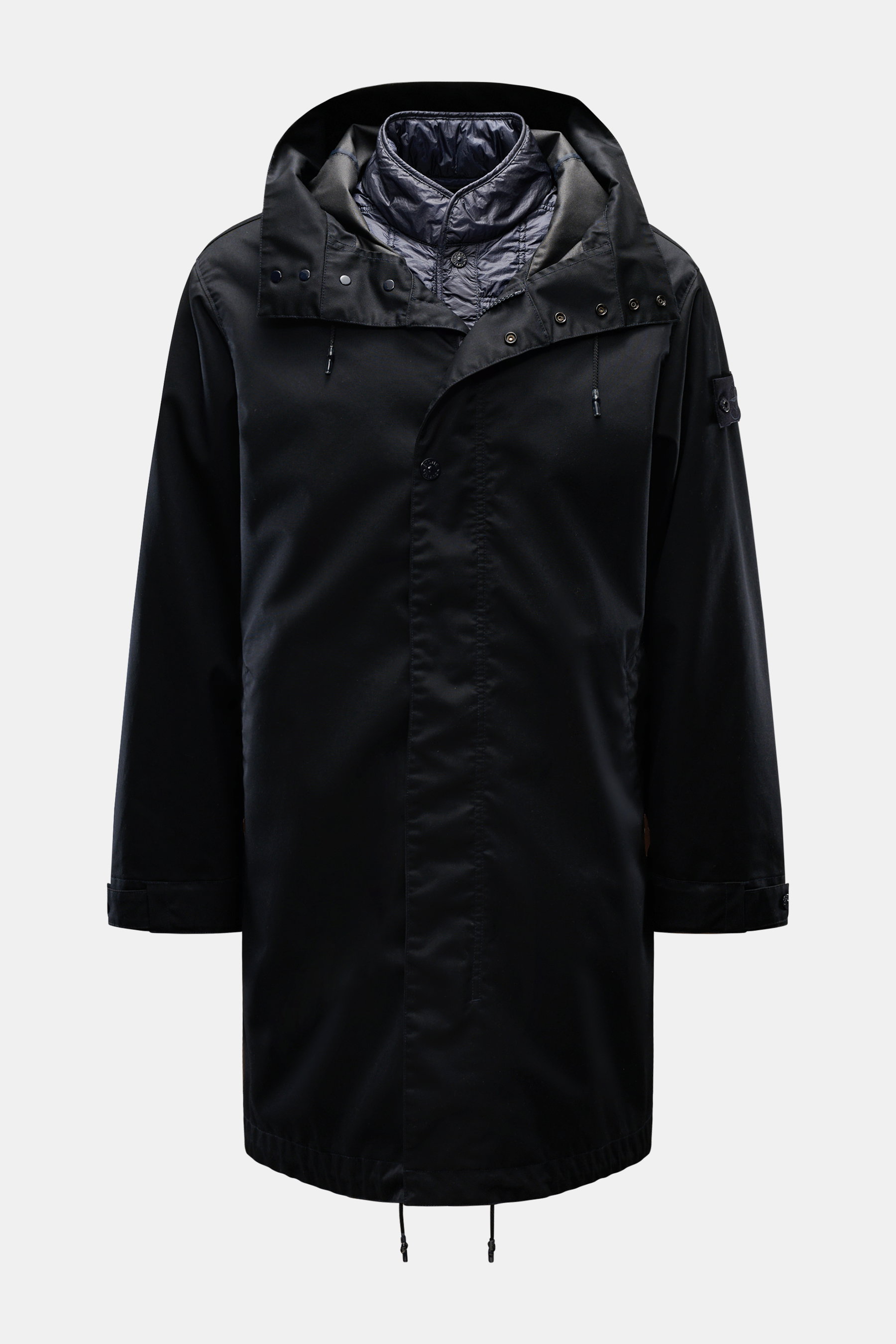 Front view of Stone Island Parka 'Twill Wool-TC Ghost Piece' navy, a lightweight parka with removable vegan Primaloft-lined inner, wool fabric, hood with drawstring, two-way zipper, snap button wind flap, slanted zip pockets, rib cuffs, tonal compass badg