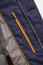 Close-up front inner view of the Moorer Down jacket 'Zavyer' navy mottled showing pure linen fabric, smooth lining, two-way zip, and leather collar detail. The elegant quilted jacket 'Zavyer' by MOORER will see you through the transitional season in style