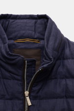 Close-up front view of Moorer Down jacket 'Alec' navy melange showing collar, zipper with branded pull, and quilted pure linen fabric, featuring a soft feel, classic topstitch, lightweight down lining, concealed hood, slim fit, two-way zip, zipped hip poc