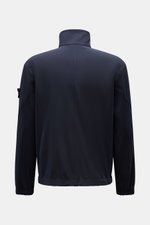Rear view of Stone Island Jacket 'Light Soft Shell-R' navy, slim fit with standing collar, elasticated cuffs, and compass badge on sleeve.