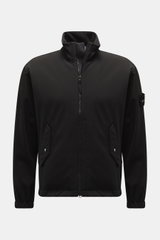 Stone Island Jacket 'Light Soft Shell-R' black shown front view, slim fit soft shell with standing collar, flap pockets, elasticated cuffs, compass badge. Style meets function: This soft shell jacket by STONE ISLAND has a sporty design in a three-layer fu