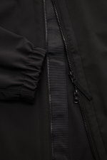 Close-up front view of Stone Island Jacket 'Light Soft Shell-R' black showing two-way zip, elasticated cuff, and smooth black fabric.

<p>Style meets function: This soft shell jacket by STONE ISLAND has a sporty design in a three-layer functional material