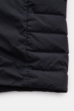 Close-up front view of Stone Island Daunenjacke 'Seamless Tunnel Nylon Down-TC' dark navy, showing smooth microfiber, light down filling, and stitching details.