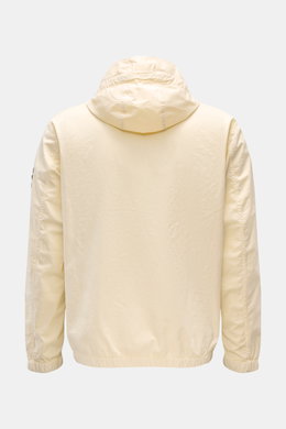 Back view of Stone Island Blouson 'Stretch Cotton Twill-TC' creme, a slim fit lightweight jacket with elastic cotton, soft touch, garment dyed, hood with drawstring, chest and side seam pockets, robust two-way zipper, and elastic hem and cuffs. Sportives 