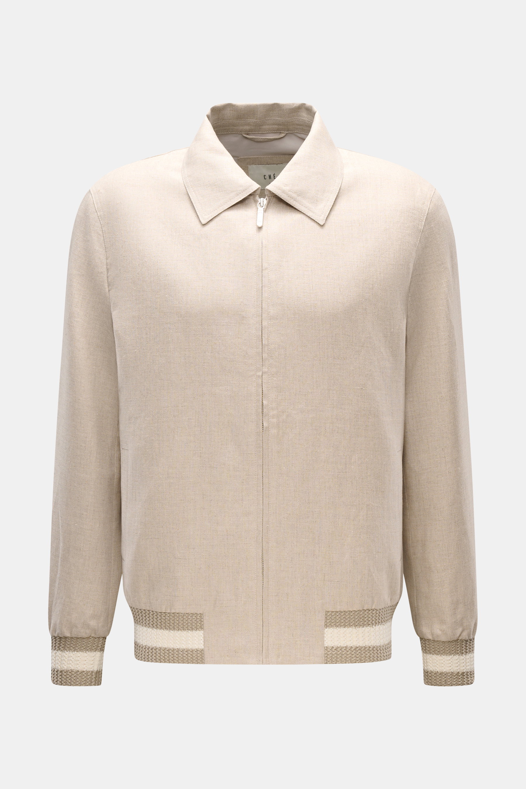 Front view of the Ché Blouson 'Benito' beige meliert, a slim fit summer jacket made of pure linen with a durable zipper, turn-down collar, piped front pockets, elastic hem and cuffs, half-lined interior, and two inner pockets. 

<p>Leicht, lässig, stilvol
