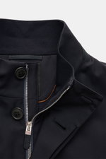 Close-up front view of Zegna Jacket 'Motorin' navy showing button and zipper closure, standing collar with leather trim, and fine stitching. <section class="text-token-text-primary w-full focus:outline-none [--shadow-height:45px] has-data-writing-block:po