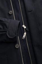 Zegna Jacket 'Motorino' navy close-up from above showing buttoned cuff, two-way silver zipper, storm flap, and pocket flap in high-quality microfibre.

<section class="text-token-text-primary w-full focus:outline-none [--shadow-height:45px] has-data-writi