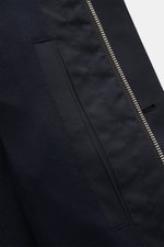 Zegna Jacket 'Motorino' navy close-up from front side showing high-quality microfibre fabric, two-way zip, and smooth pocket detail.