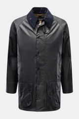 Front view of Barbour Waxed jacket 'Beaufort' dark navy in waxed cotton with corduroy collar, patch pockets, and water-repellent finish.

Description:
<p>A true classic in the British outdoor tradition: The waxed jacket 'Beaufort' by BARBOUR is made of ro