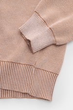 Close-up top-down view of the Moorer Cardigan 'Urbino' off-white/light brown mottled showing ribbed cuffs and hem with medium-fine knit texture.

Description: <p>Confident layering: This MOORER cardigan has a clean silhouette and a timeless design that ma