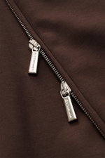Close-up, top-down view of the two-way zip with silver "MOORER" branded pulls on the dark brown Moorer Sweat jacket 'Crispin Felpa' made from a soft cotton-microfibre blend, featuring a slim fit, standing collar, zip front pockets, elastic hem and sleeve 