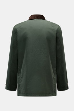 Manifattura Ceccarelli Waxed jacket 'Raincaban' dark green shown from the back, featuring waxed cotton, water repellent fabric, slim fit, corduroy collar trim, storm flap with buttons, raglan sleeves, and robust two-way zip.