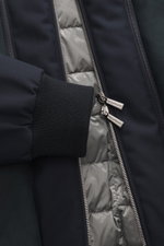 Close-up front view of Moorer Down blouson 'Janos' navy showing zipper, ribbed cuff, and silver down lining with dual zippers.

<p>The down blouson 'Janos' by MOORER perfectly combines functionality and timeless style. Made of high-quality microfibre with