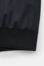 Close-up front view of the ribbed band and high-quality microfibre fabric of the Moorer Down blouson 'Janos' navy, showing smooth feel and craftsmanship.