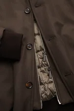 Close-up front view of the Moorer Down blouson 'Janos' dark brown, showcasing microfibre shell, button placket, zipper, and ribbed cuff.

<p>The down blouson 'Janos' by MOORER perfectly combines functionality and timeless style. Made of high-quality micro