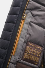 Close-up front interior view of Moorer Jacket 'Nobile' navy showing water repellent stretchy microfiber fabric, double front with two-way zip, smooth lining, and luxury quality label. 

Description: <p>With its water repellent finish and clean look with d