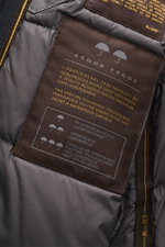 Close-up inside view of Moorer Jacket 'Nobile' navy showing waterproof label and smooth grey lining, highlighting quality details.

Description: <p>With its water repellent finish and clean look with double front, the jacket 'Nobile' by MOORER is the perf