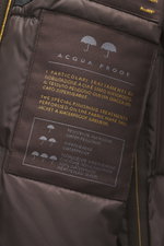 Close-up inside view of the Moorer Jacket 'Nobile' dark brown showing the waterproof fabric label and smooth lining, photographed from the interior.

Description: <p>With its water repellent finish and clean look with double front, the jacket 'Nobile' by 