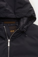 Close-up front view of Moorer Down blouson 'Oniro' navy showing the hood, silver two-way zip, and quilted lightweight down lining.

Description: <p>Maximum function in incredibly lightweight fabric: The sporty down blouson 'Oniro' has a warm down lining a